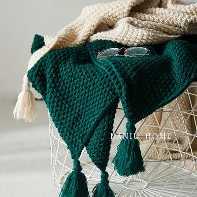 Elegant wool knit blanket with tassels