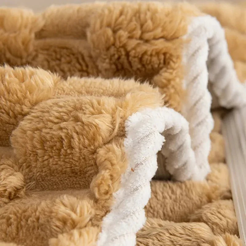 Thick plush blanket in soft pastel shades